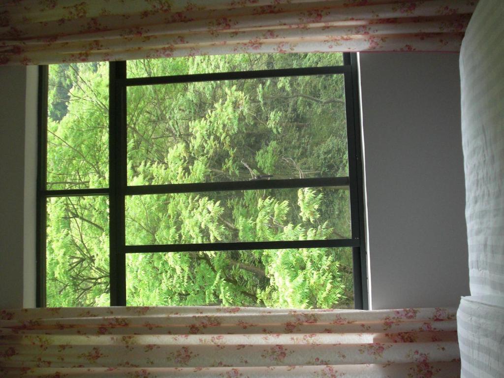 Huanggong Garden Hotel Yangshuo Room photo