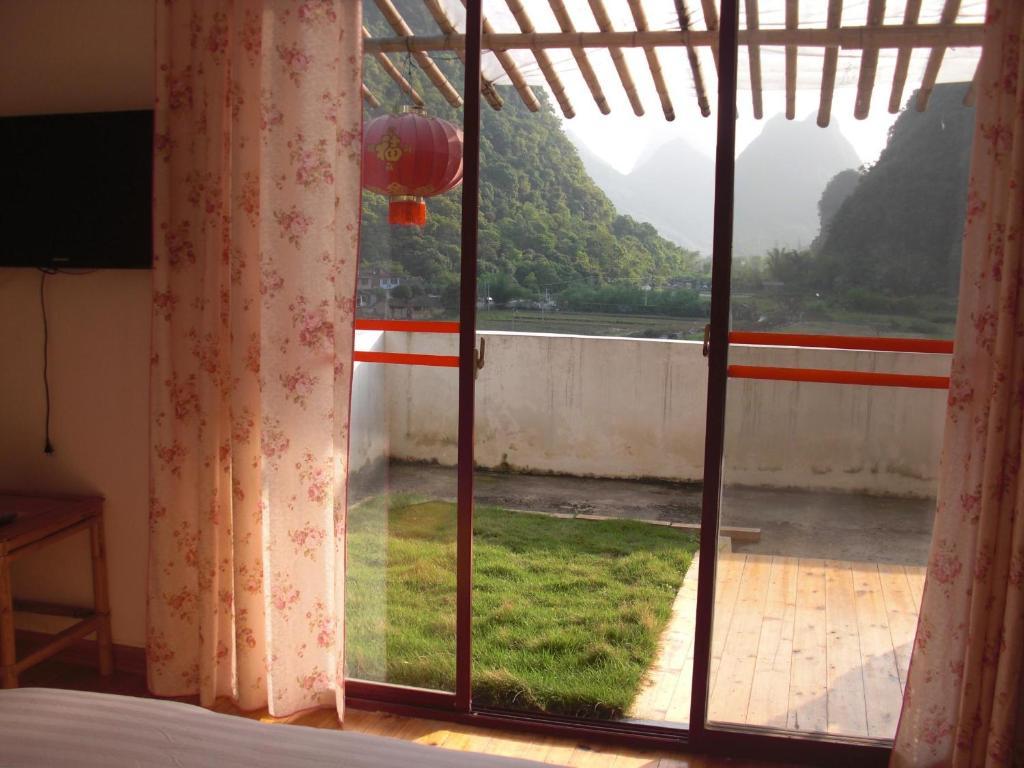 Huanggong Garden Hotel Yangshuo Room photo